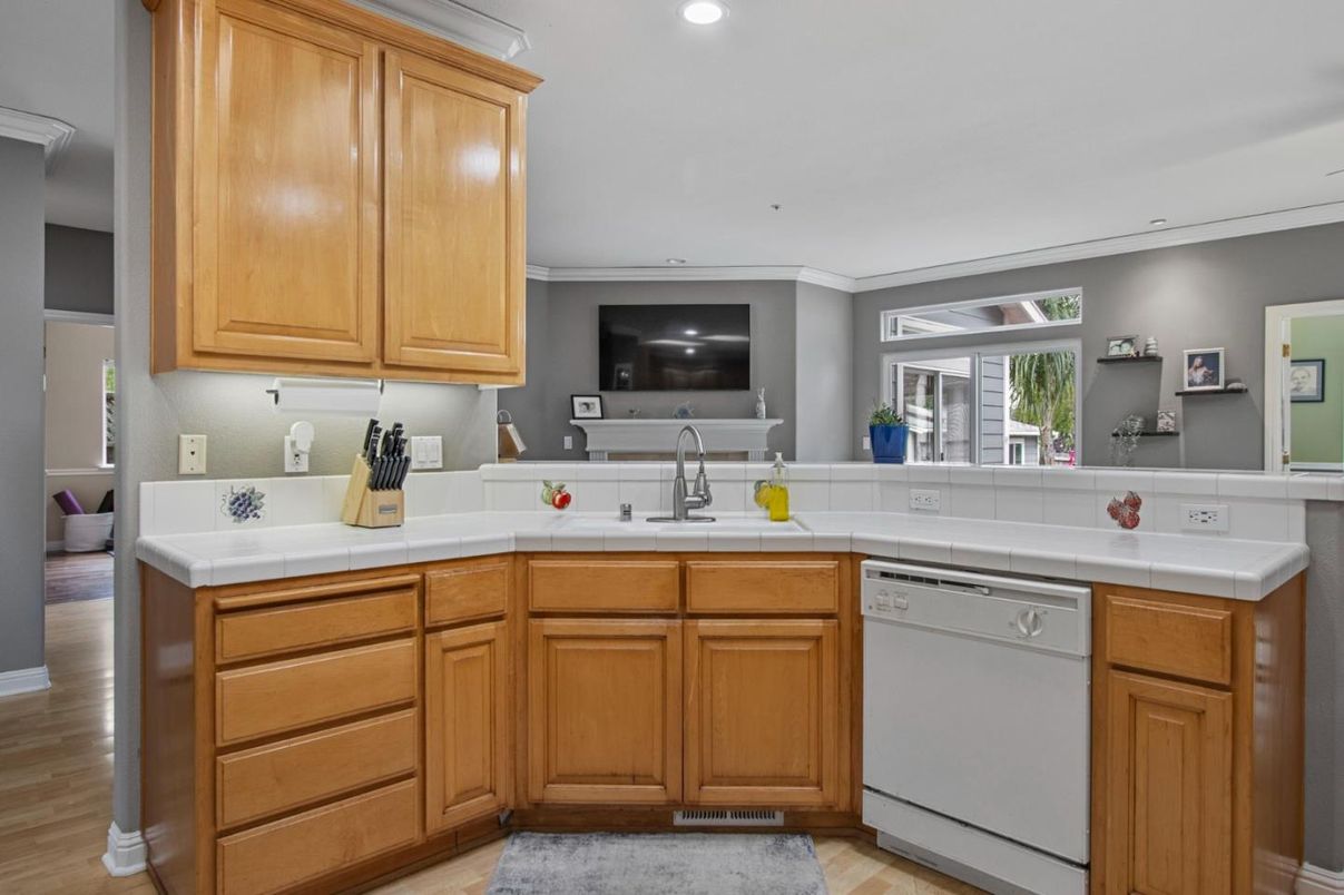 Interior, Kitchen, Recessed Lighting, Tile Countertops, Wood Texture Flooring