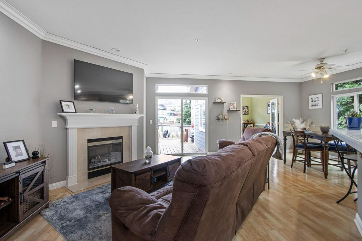 Dining room, Fireplace, Interior, Living room, Recessed Lighting, Wood Texture Flooring