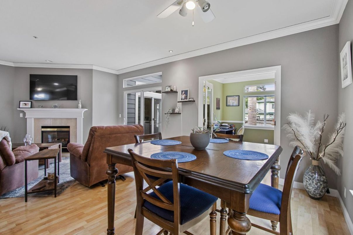 Dining room, Fireplace, Interior, Living room, Recessed Lighting, Wood Texture Flooring