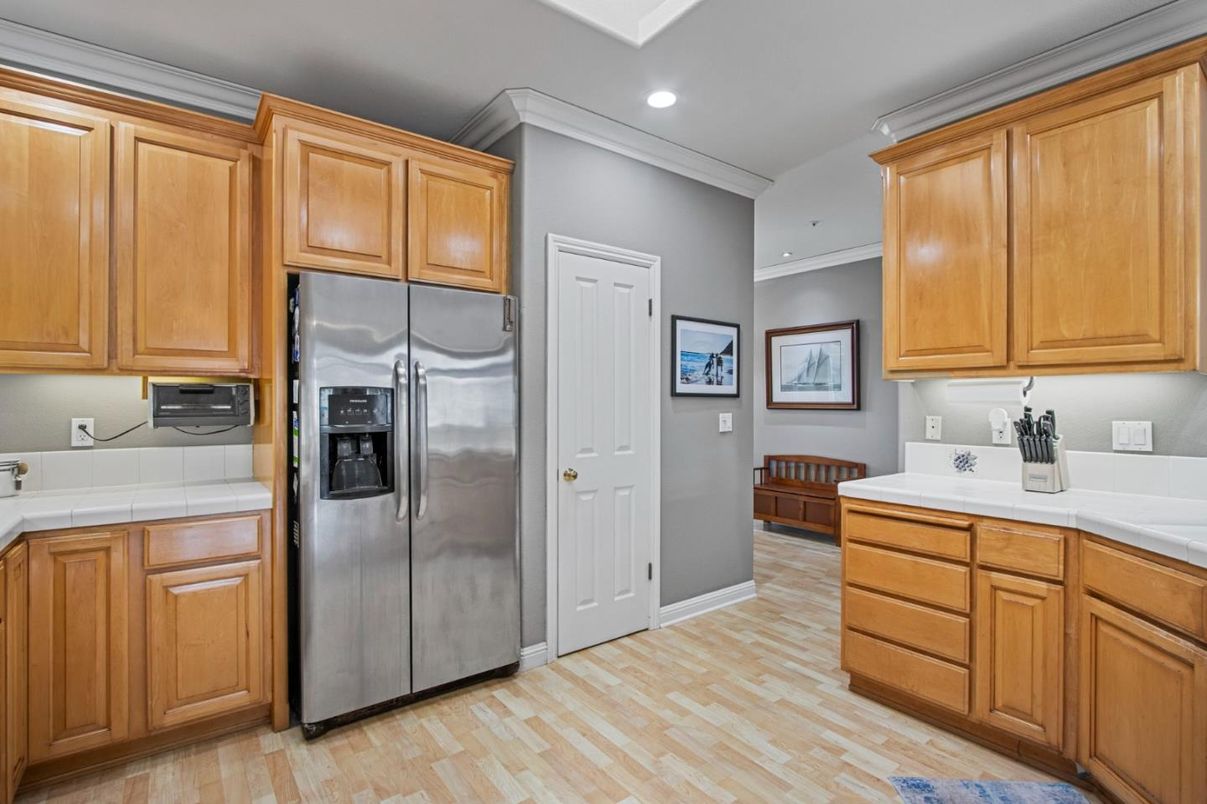 Interior, Kitchen, Recessed Lighting, Tile Countertops, Wood Texture Flooring