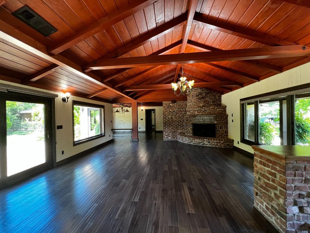 Chandelier, Empty room, Fireplace, Interior, Stone Walls, Wooden Beams, Wooden Ceilings, Wood Texture Flooring
