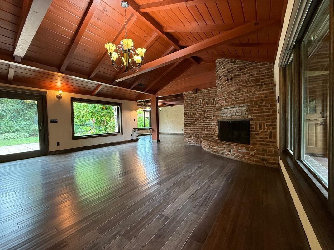 Chandelier, Empty room, Fireplace, Interior, Stone Walls, Wooden Beams, Wooden Ceilings, Wood Texture Flooring