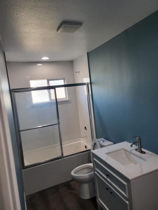 Bathroom, Glass Shower, Interior, Recessed Lighting, Wood Texture Flooring