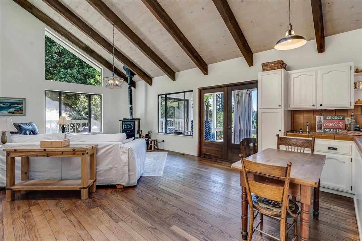Dining room, Fireplace, Interior, Kitchen, Living room, Pendant Lights, Wooden Beams, Wood Texture Flooring