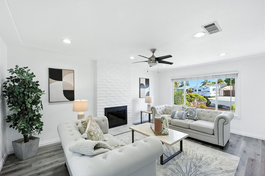 Fireplace, Interior, Living room, Recessed Lighting, Stone Walls, Wood Texture Flooring