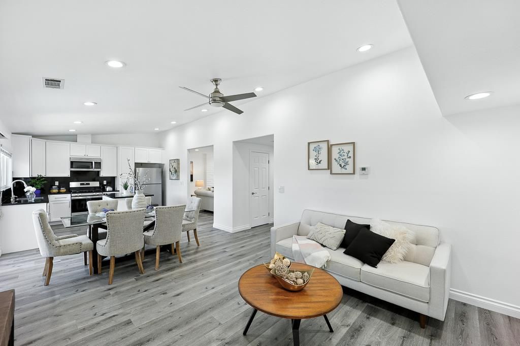Dining room, Interior, Kitchen, Living room, Recessed Lighting, Stainless Steel Appliances, Wood Texture Flooring