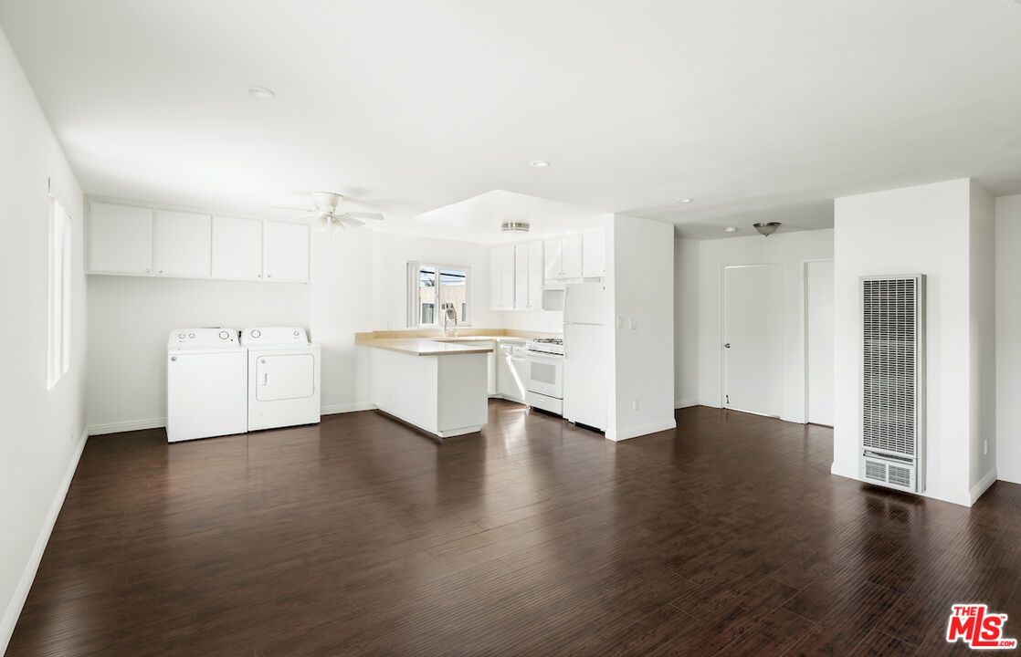 Interior, Kitchen, Recessed Lighting, Washer, Wood Texture Flooring