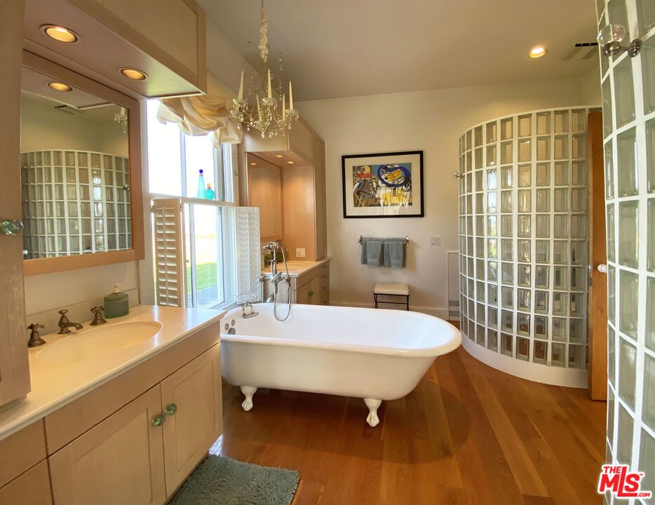 Bathroom, Chandelier, Free Standing Baths, Interior, Recessed Lighting, Wood Texture Flooring