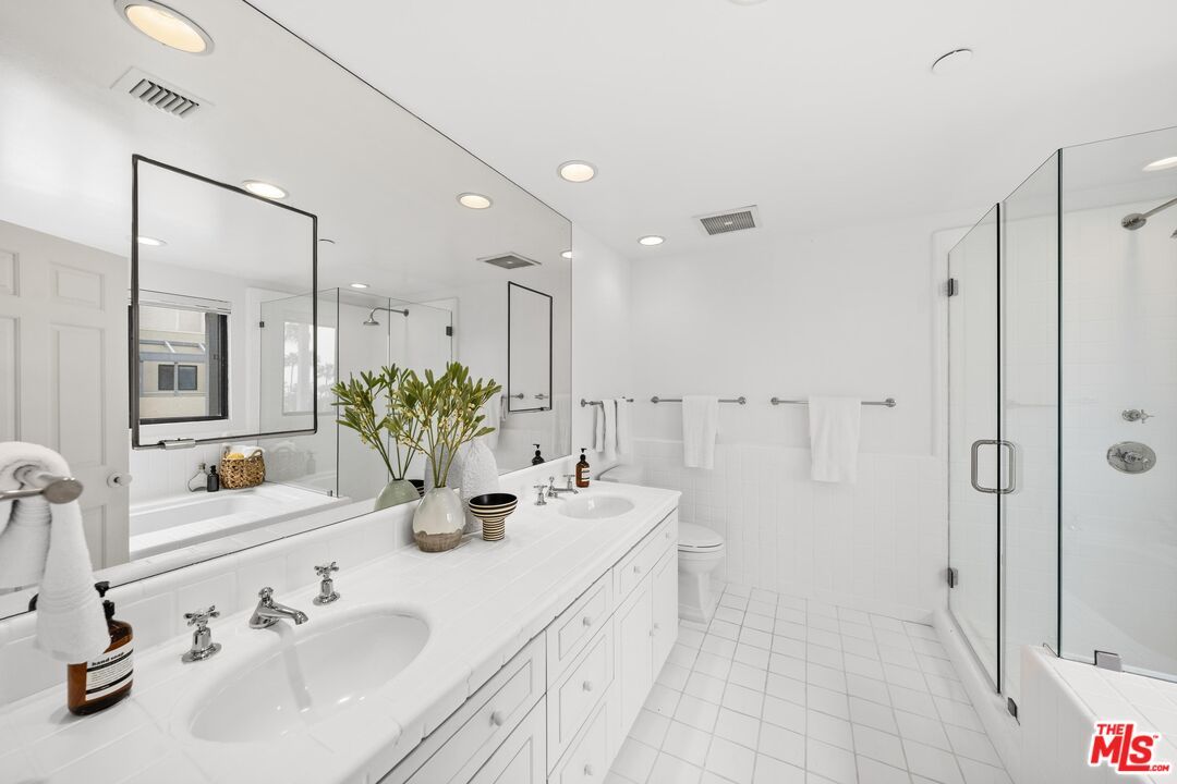 Bathroom, Dual Sink Vanities, Glass Shower, Interior, Recessed Lighting, Tile Countertops