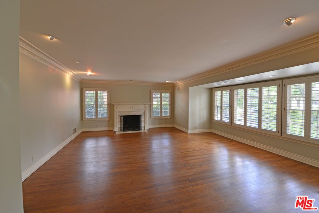 Empty room, Fireplace, Interior, Recessed Lighting, Wood Texture Flooring