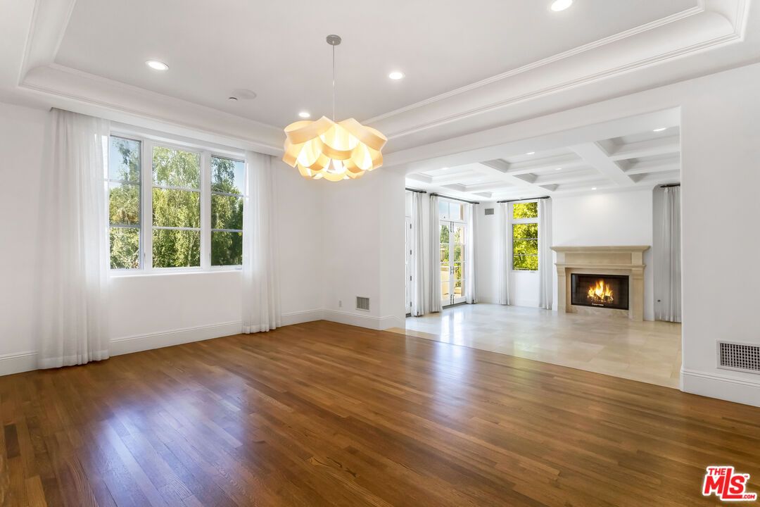 Empty room, Fireplace, Interior, Pendant Lights, Recessed Lighting, Wood Texture Flooring