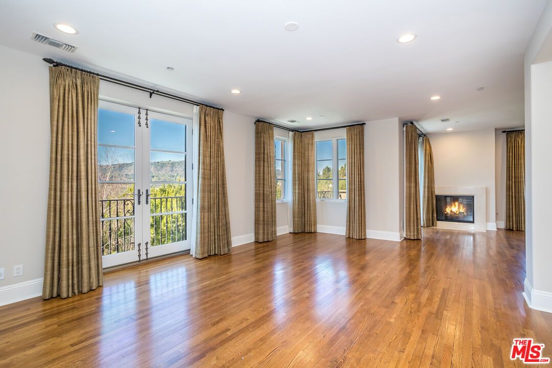 Empty room, Fireplace, Interior, Recessed Lighting, Wood Texture Flooring
