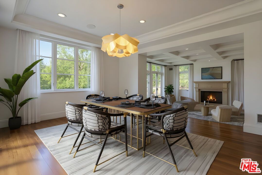 Dining room, Fireplace, Interior, Living room, Pendant Lights, Recessed Lighting, Wood Texture Flooring