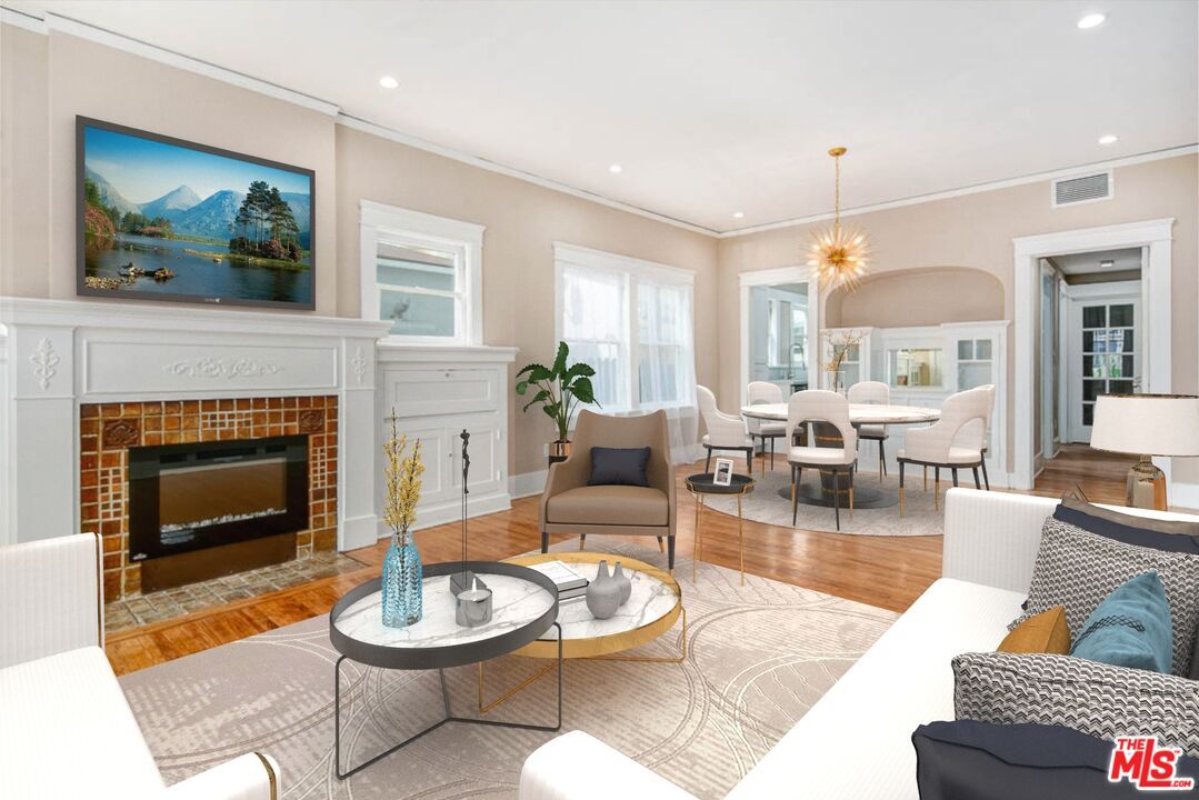 Dining room, Fireplace, Interior, Living room, Pendant Lights, Recessed Lighting, Wood Texture Flooring