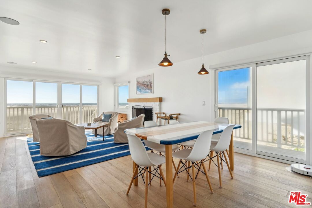 Dining room, Fireplace, Interior, Living room, Pendant Lights, Recessed Lighting, Wood Texture Flooring