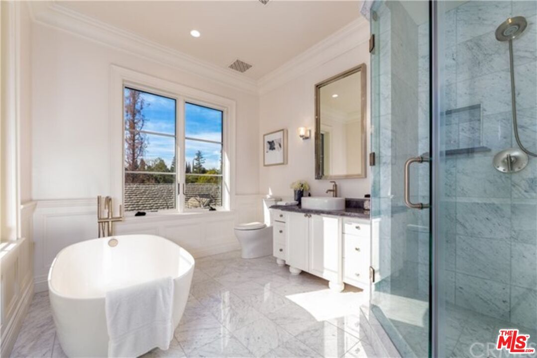 Bathroom, Dual Sink Vanities, Free Standing Baths, Glass Shower, Interior, Marble, Marble Walls, Recessed Lighting
