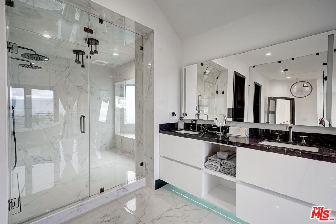 Bathroom, Dual Sink Vanities, Glass Shower, Interior, Marble, Marble Walls, Recessed Lighting