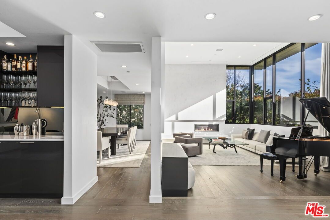 Dining room, Fireplace, Interior, Living room, Pendant Lights, Piano, Recessed Lighting, Wood Texture Flooring