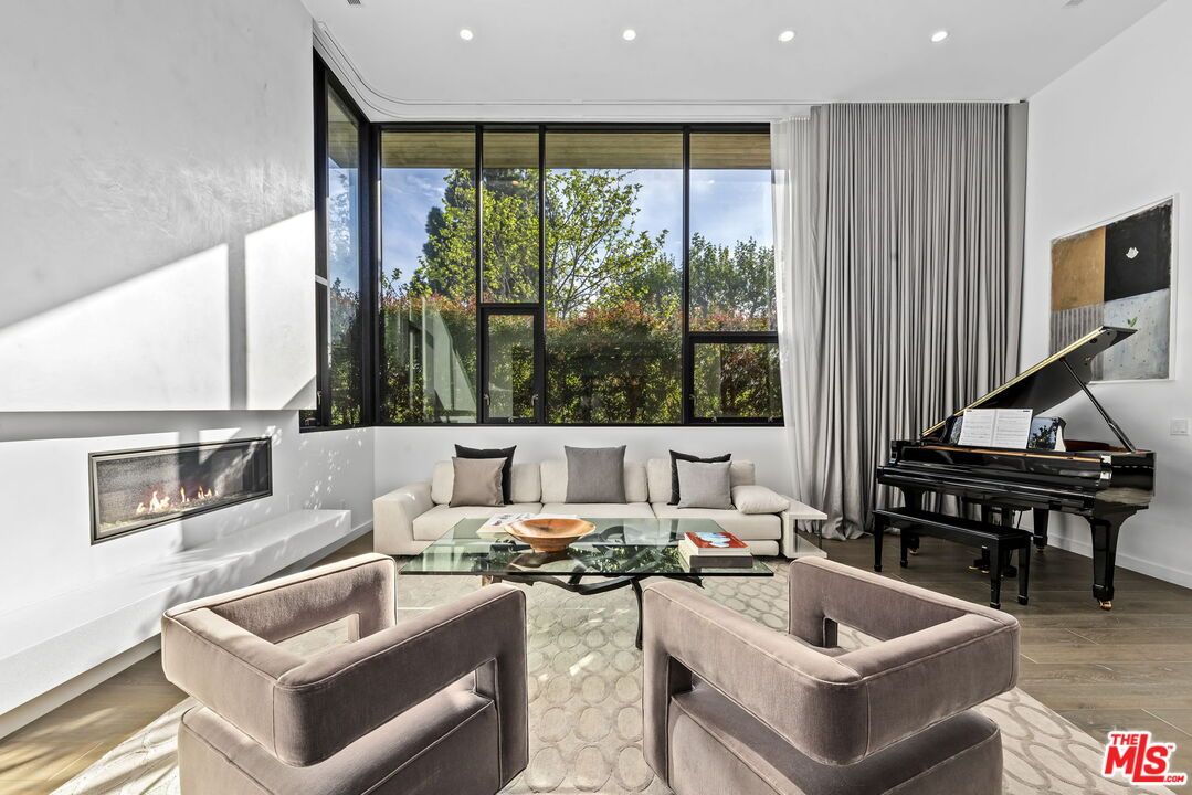 Fireplace, Interior, Living room, Piano, Recessed Lighting, Wood Texture Flooring