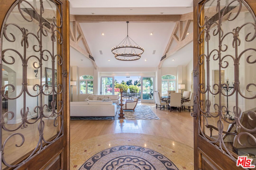 Chandelier, Dining room, Interior, Living room, Pendant Lights, Recessed Lighting, Wooden Beams, Wood Texture Flooring