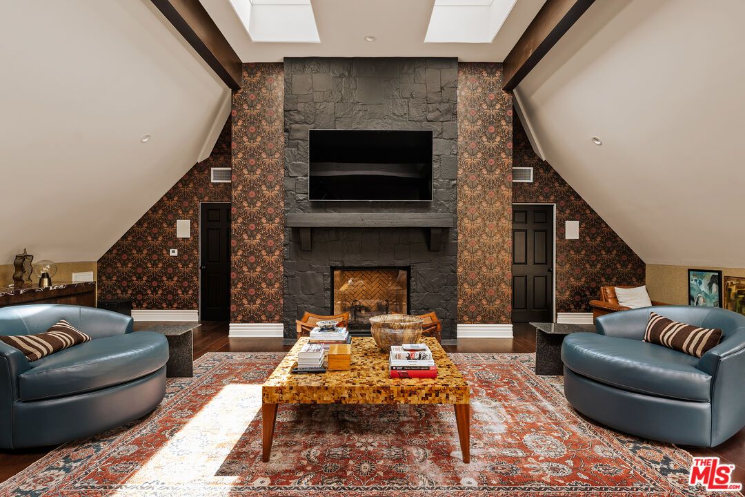 Fireplace, Interior, Living room, Recessed Lighting, Stone Walls, Wood Texture Flooring
