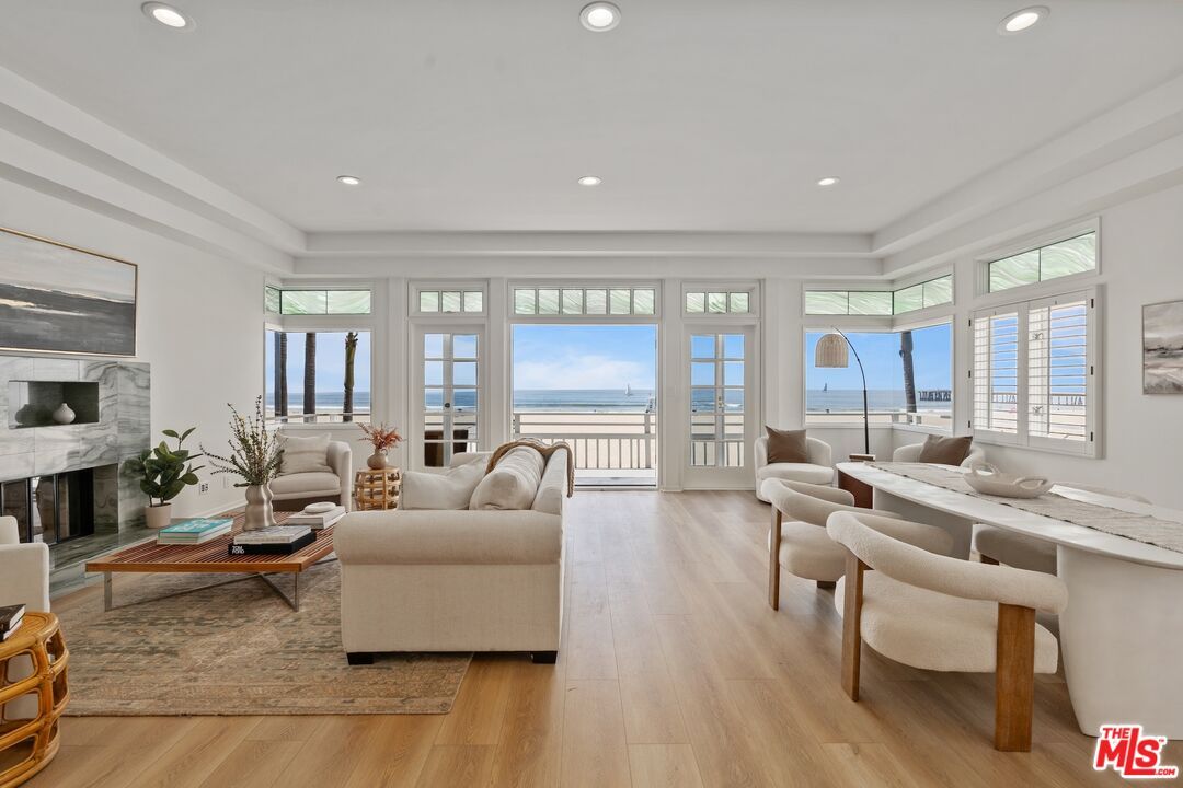 Fireplace, Interior, Living room, Recessed Lighting, Water, Wood Texture Flooring