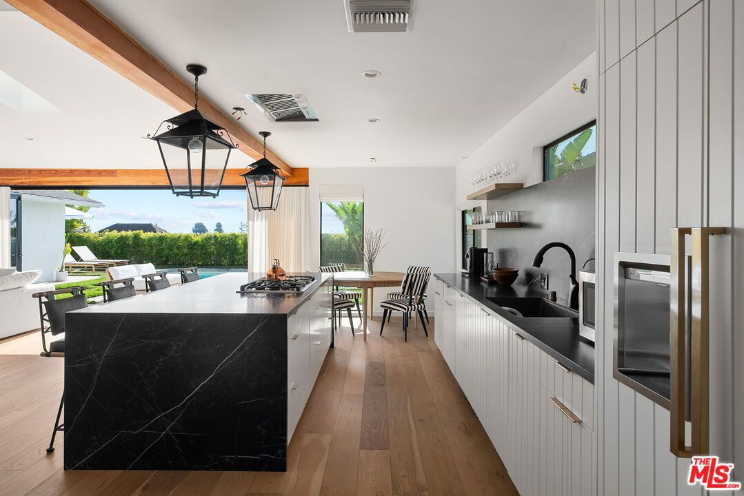 Dining room, Interior, Kitchen, Pendant Lights, Recessed Lighting, Stainless Steel Appliances, Wooden Beams, Wood Texture Flooring