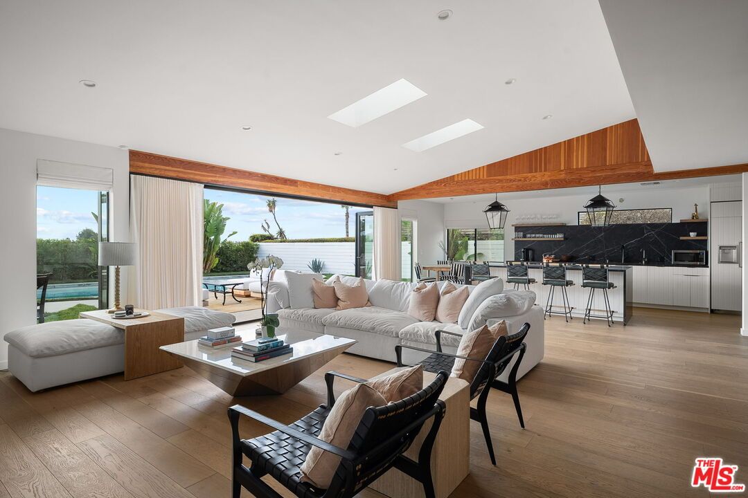 Dining room, Interior, Kitchen, Living room, Marble Walls, Pendant Lights, Recessed Lighting, Water, Wood Texture Flooring