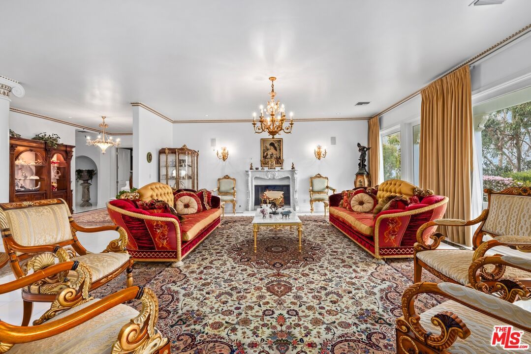 Chandelier, Fireplace, Interior, Living room