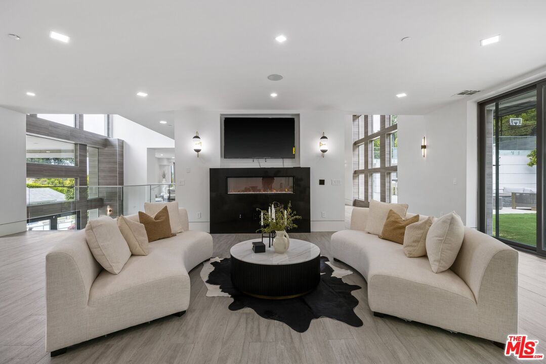 Fireplace, Interior, Living room, Recessed Lighting, Wood Texture Flooring