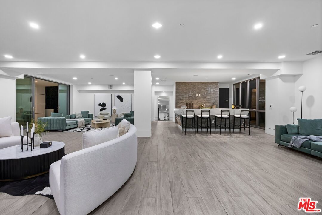 Dining room, Interior, Kitchen, Living room, Recessed Lighting, Stone Walls, Wood Texture Flooring