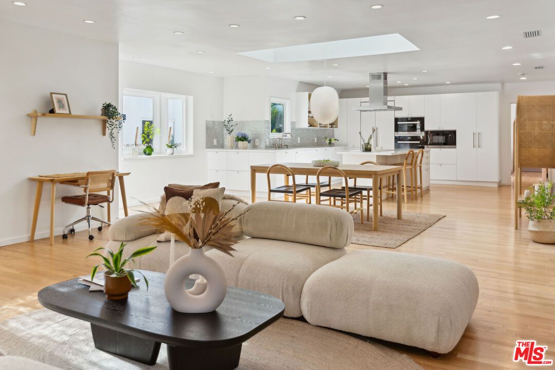 Dining room, Interior, Kitchen, Living room, Pendant Lights, Recessed Lighting, Stainless Steel Appliances, Wood Texture Flooring