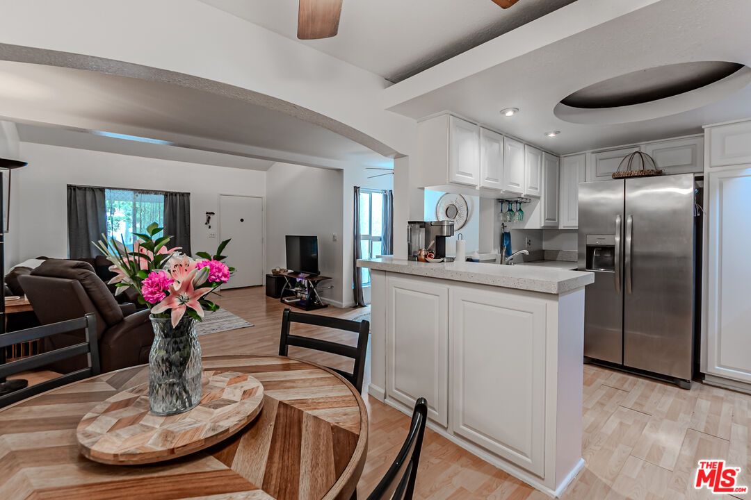 Dining room, Interior, Kitchen, Recessed Lighting, Stainless Steel Appliances, Wood Texture Flooring