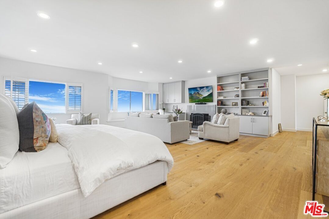 Bedroom, Fireplace, Interior, Living room, Recessed Lighting, Wood Texture Flooring