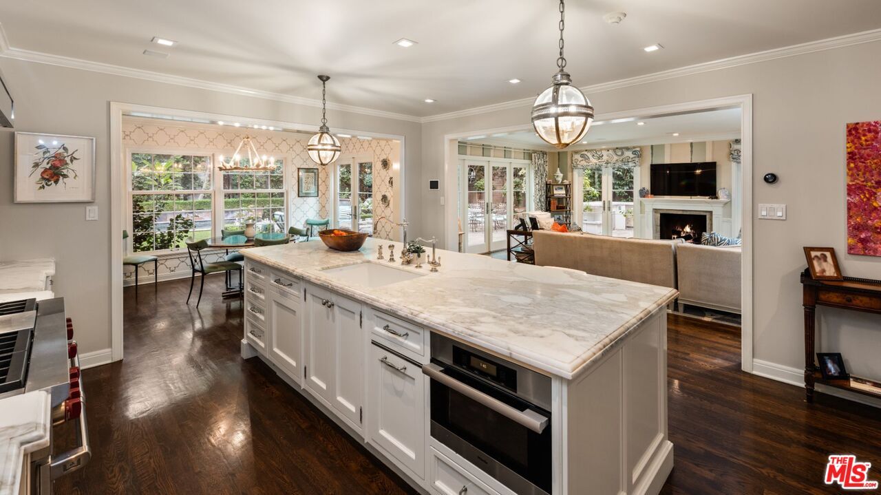 Chandelier, Dining room, Fireplace, Interior, Kitchen, Living room, Pendant Lights, Recessed Lighting, Wood Texture Flooring