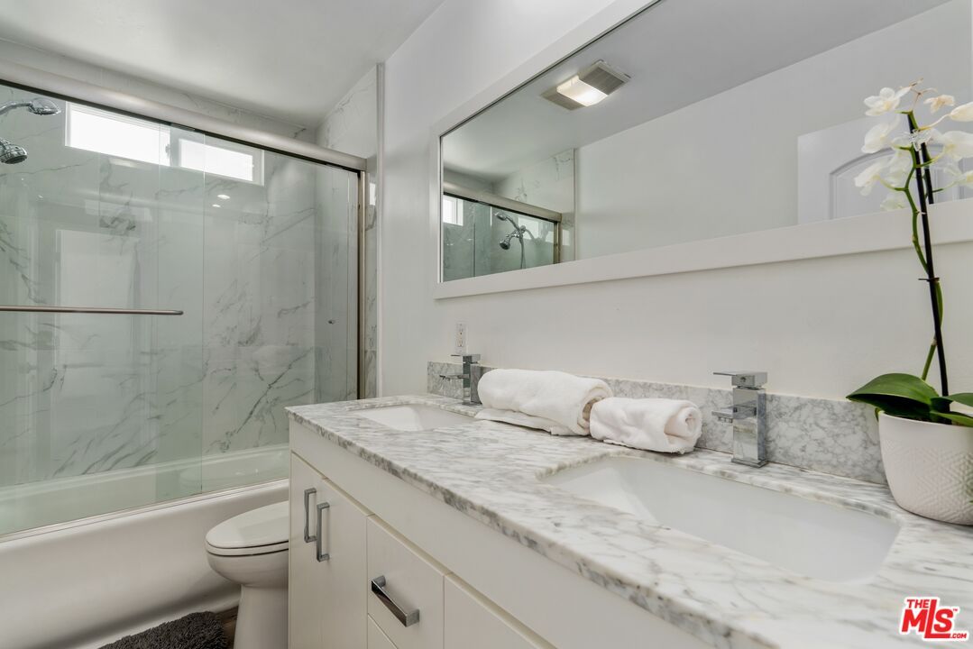 Bathroom, Dual Sink Vanities, Glass Shower, Interior, Marble Walls