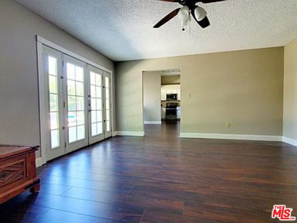 Empty room, Interior, Kitchen, Stainless Steel Appliances, Wood Texture Flooring