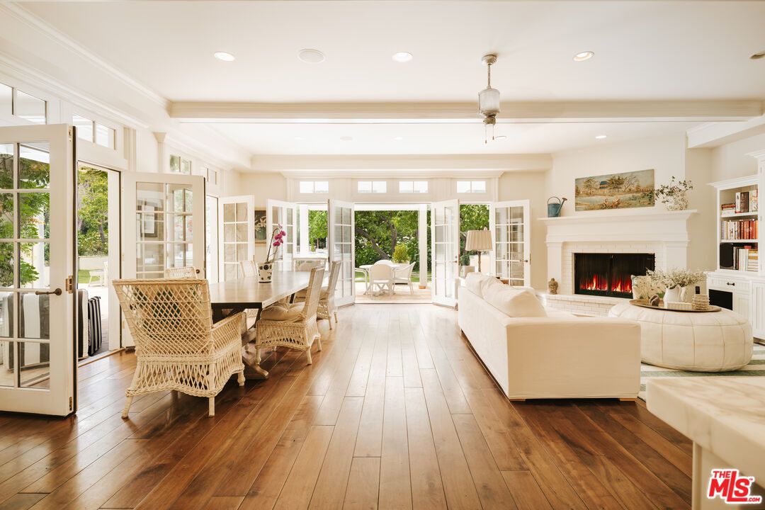 Dining room, Fireplace, Interior, Living room, Pendant Lights, Recessed Lighting, Wood Texture Flooring