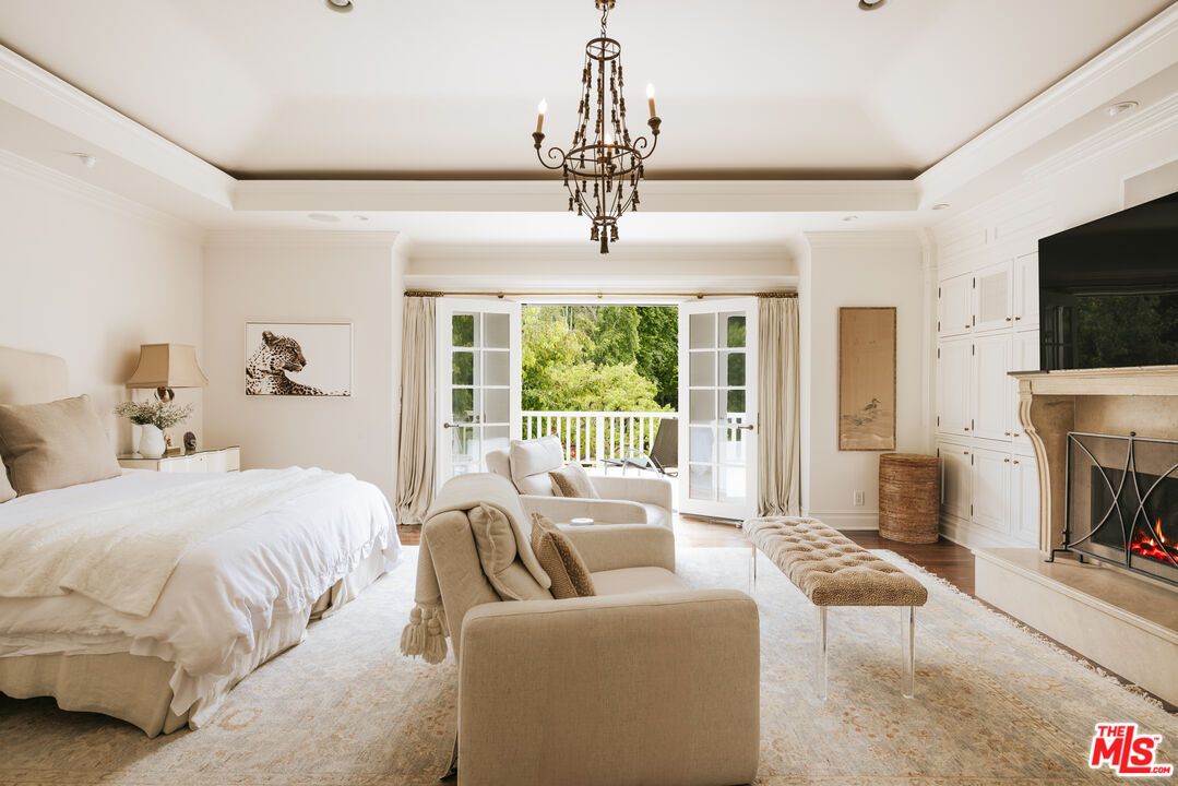 Bedroom, Chandelier, Fireplace, Interior, Recessed Lighting, Wood Texture Flooring