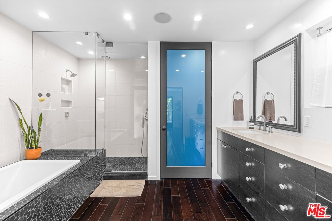 Bathroom, Dual Sink Vanities, Glass Shower, Interior, Recessed Lighting, Wood Texture Flooring