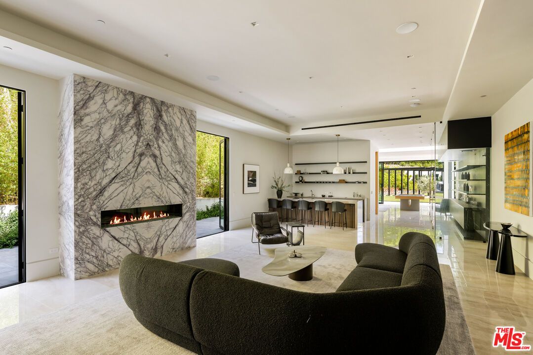 Fireplace, Interior, Living room, Marble Walls, Pendant Lights, Recessed Lighting