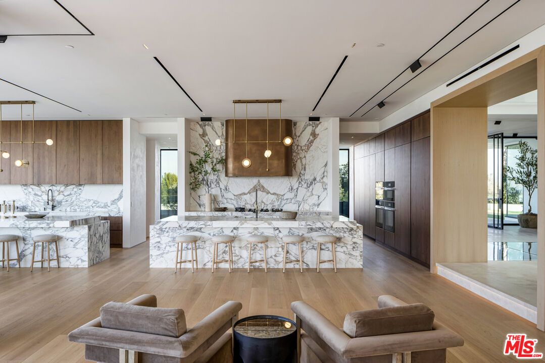 Interior, Kitchen, Marble Walls, Pendant Lights, Recessed Lighting, Stainless Steel Appliances, Wood Texture Flooring