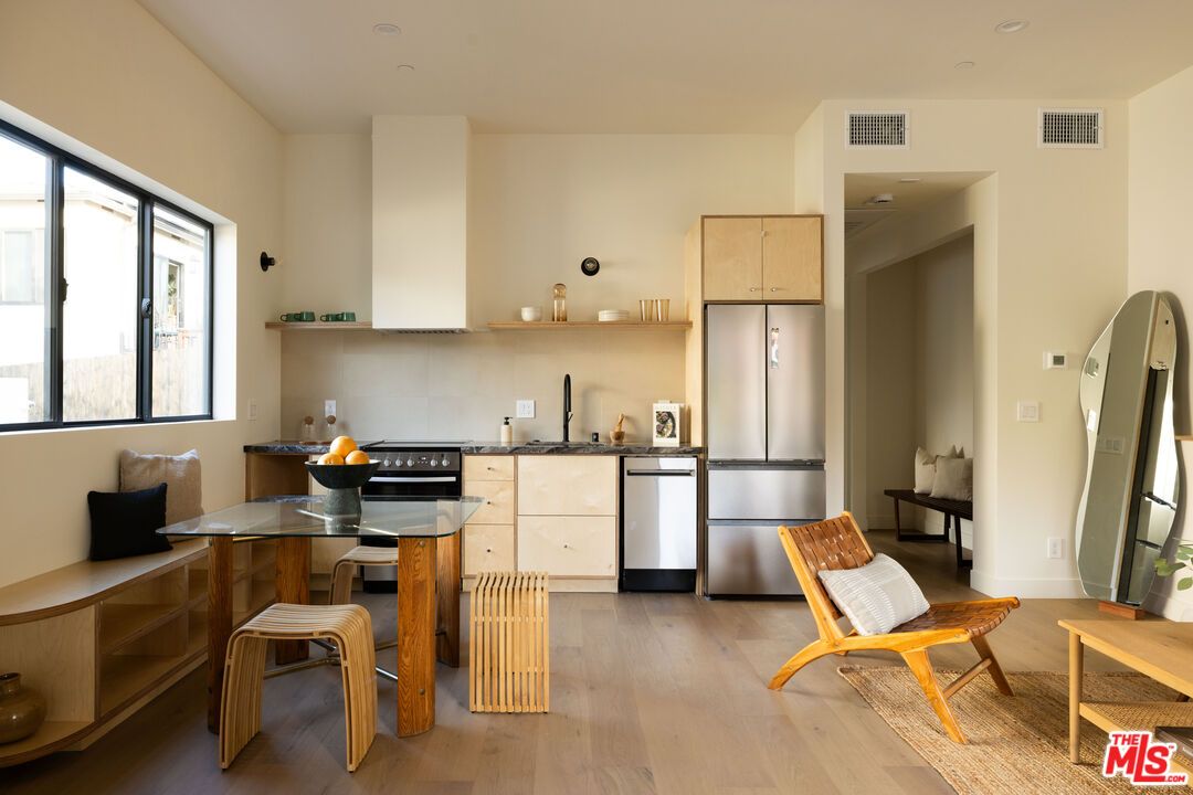 Dining room, Interior, Kitchen, Recessed Lighting, Stainless Steel Appliances, Wood Texture Flooring