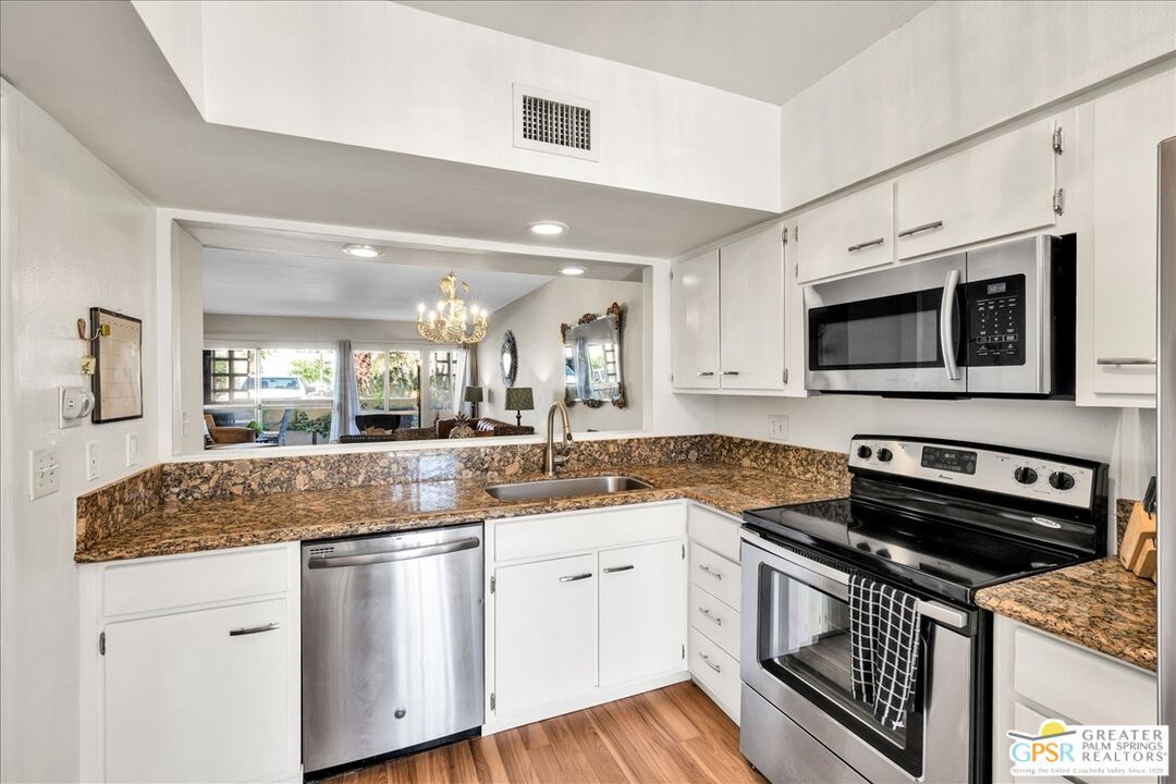 Chandelier, Interior, Kitchen, Recessed Lighting, Stainless Steel Appliances, Wood Texture Flooring