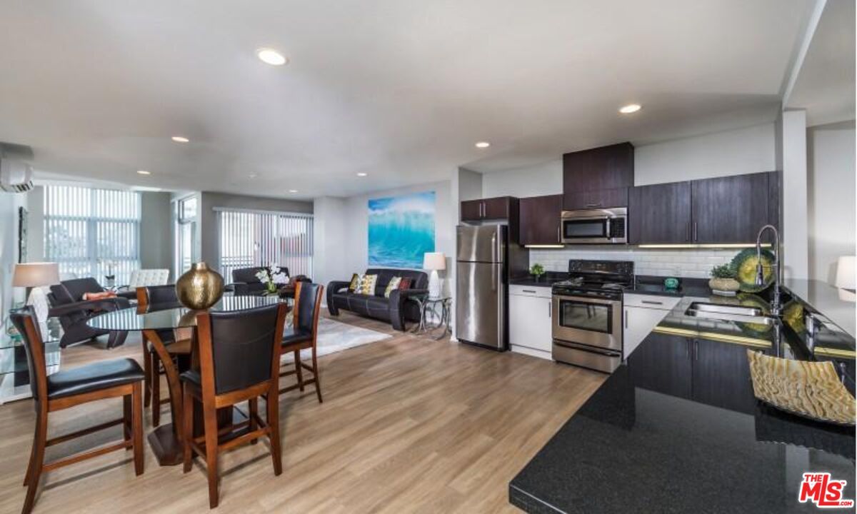 Dining room, Interior, Kitchen, Living room, Recessed Lighting, Stainless Steel Appliances, Wood Texture Flooring