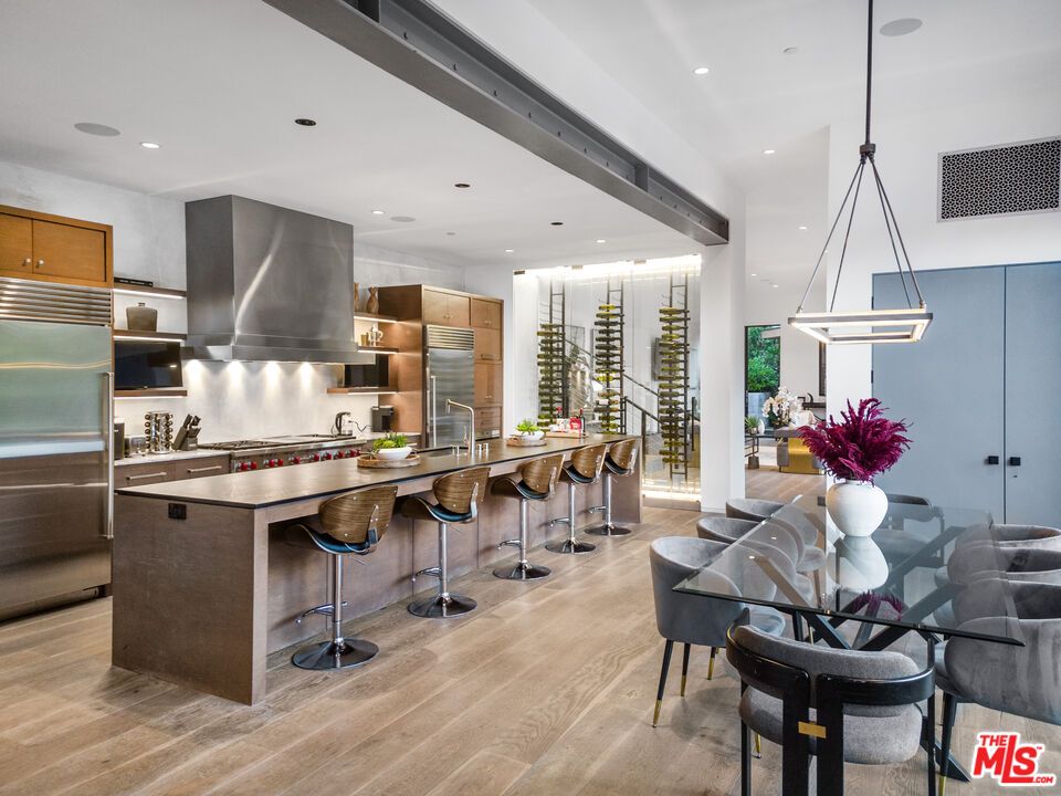 Dining room, Interior, Kitchen, Pendant Lights, Recessed Lighting, Stainless Steel Appliances, Wood Texture Flooring