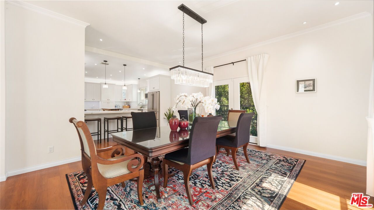 Chandelier, Dining room, Interior, Kitchen, Pendant Lights, Recessed Lighting, Stainless Steel Appliances, Wood Texture Flooring