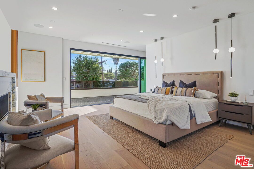 Bedroom, Fireplace, Interior, Pendant Lights, Recessed Lighting, Wood Texture Flooring