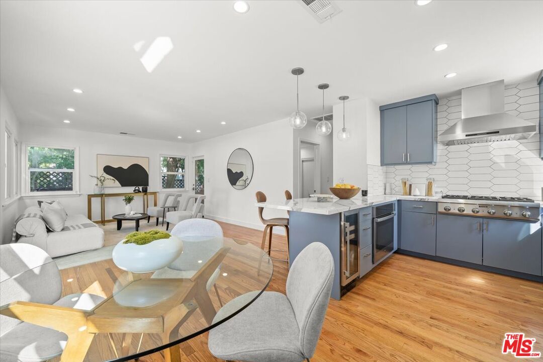 Dining room, Interior, Kitchen, Living room, Pendant Lights, Recessed Lighting, Stainless Steel Appliances, Wood Texture Flooring