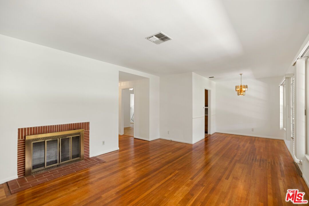 Chandelier, Empty room, Fireplace, Interior, Wood Texture Flooring
